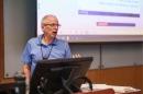 Roger Grinde gives a presentation at the 2023 University of New Hampshire Faculty Excellence Awards.